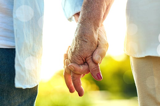 two people holding hands